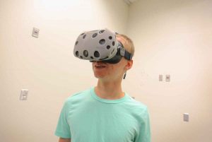 Student wearing virtual reality head-gear