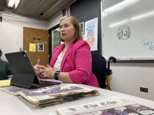 Alena Skinner in The ECHO office talking during her interview.