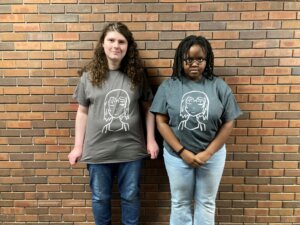 the author and her friend, wearing the t-shirts Kane made in Art Club.