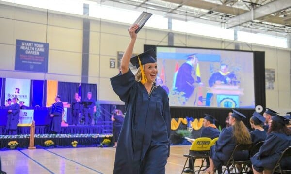 RCTC grad celebrating