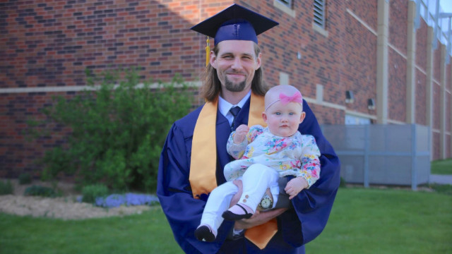 Photos courtesy of College Relations and Marketing RCTC grad holding a baby