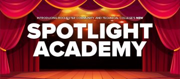 Theatre stage with red curtains and the text: Spotlight Academy