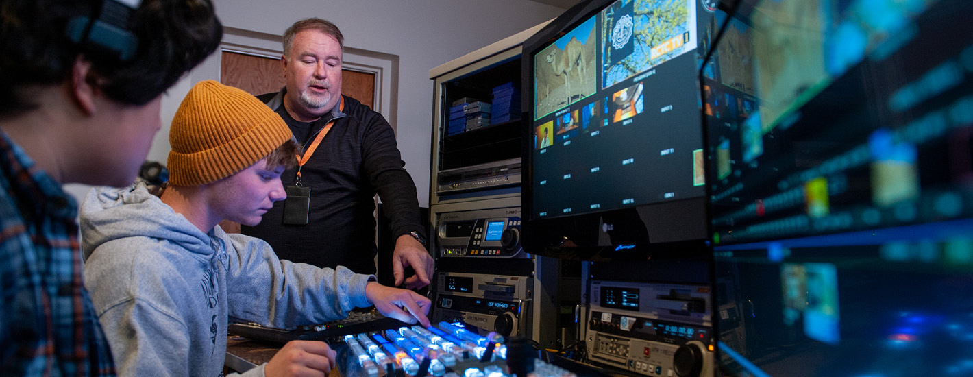 RCTC Mass Communications instructor guiding RCTC TV Production Students